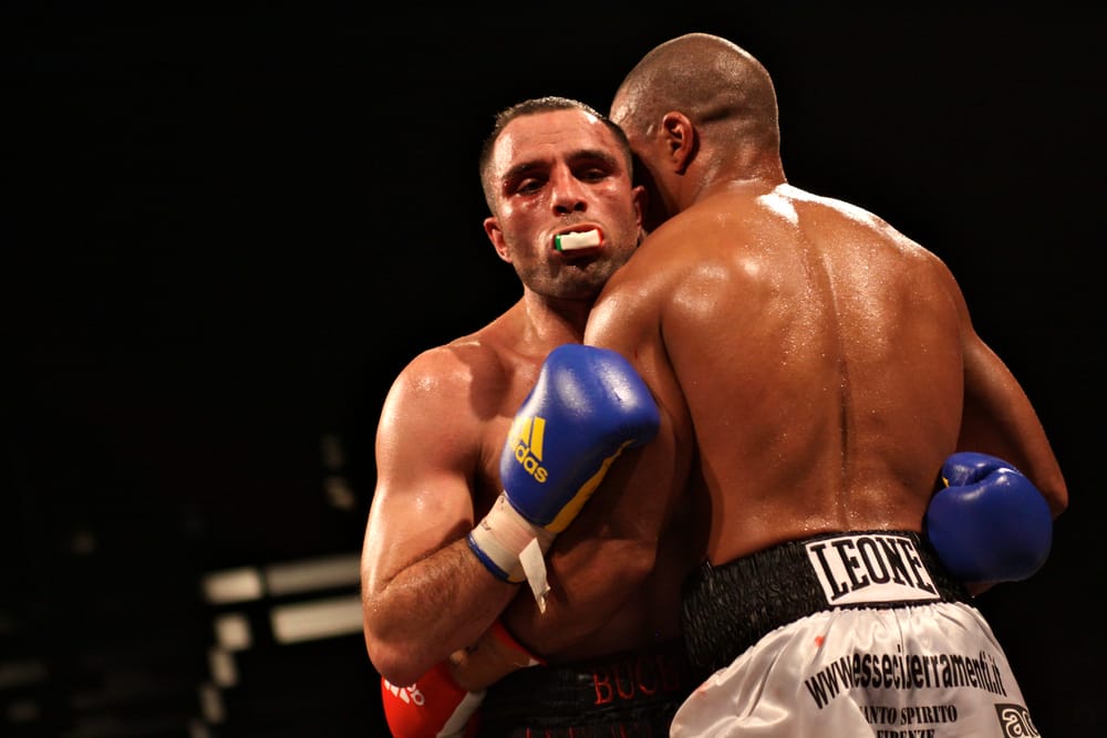 Why Do Boxers Hug? (Clinching Explained) NY Boxing Gym